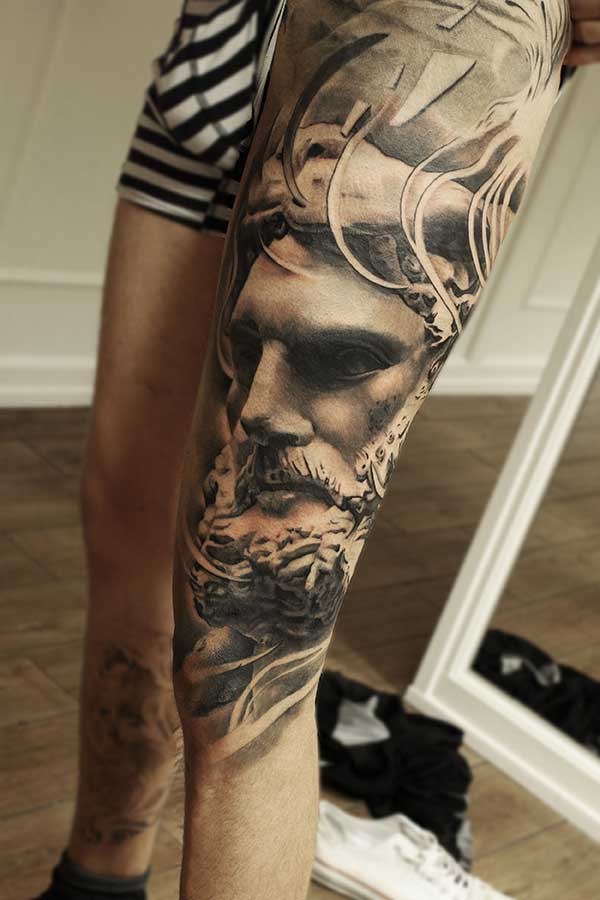 na Perna 0 Tatuagem de Zeus.