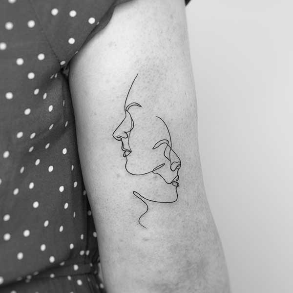 tatuagem de linha fina no braco